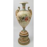 A Royal Worcester blush ivory pedestal vase, decorated with thistles and flowers,