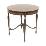 A walnut circular centre table, with cross banded decoration,