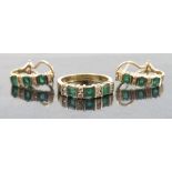 A 14k emerald and diamond ring,