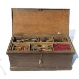 A 19th century Victorian painted pine carpenters chest and tools, to include various wooden planes,