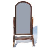 A 19th century mahogany cheval mirror, raised on outswept legs,