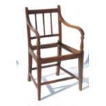 A 19th century armchair, possibly fruitwood, in the Hepplewhite style,