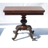 A 19th century rosewood fold over tea table, of rectangular form,