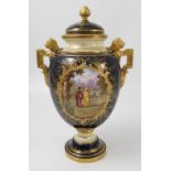 A Coalport covered vase, decorated with a reserve 'In the Garden' by J Keeling,