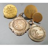 Seven Axe Vale Hunt brass buttons, together with four small buttons, retailed by Pitt and Co,