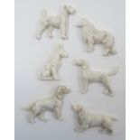 A group of un-marked Royal Worcester porcelain dog brooches, all blank, some being duplicates,