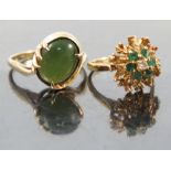 An emerald and diamond 18ct gold cluster ring, London 1967, finger size K, weight 5g gross,