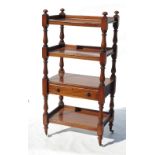 A 19th century four tier what not, the rectangular shelves divided by turned columns,