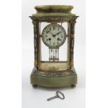 A late 19th century French gilt brass, champleve enamel and onyx four glass mantel clock,