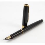 A black Parker fountain pen,