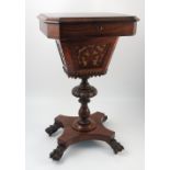 A 19th century rosewood sewing table, the rising lid of rectangular form with canted corners,
