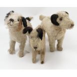 Three plush models of terrier dogs,
