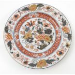 A Chinese Kangxi porcelain plate, decorated in reds, blues and gilt with flowers and leaves,