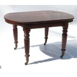A rosewood table, with D-shaped ends, raised on an associated base with four reeded legs,