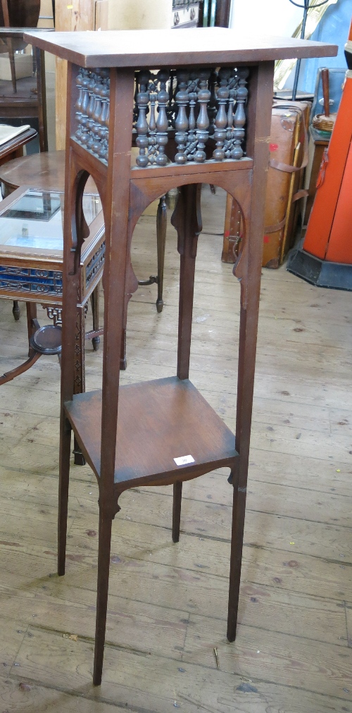 A Liberty London mahogany jardiniere stand,