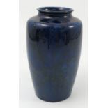 A Ruskin pottery vase, designed by William Howson Taylor, decorated with a mottled blue glaze,