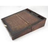 A 19th century walnut travelling writing box, with brass banding,