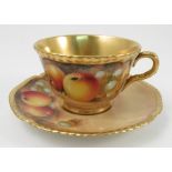 A Royal Worcester tea cup and saucer,