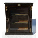 A late 19th century ebonised pier cabinet, with small Sevres panels,