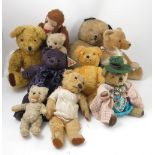 A collection of 20th century teddy bears, to include a large gold plush teddy,