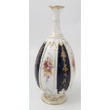 A Royal Worcester vase, decorated with alternating panels of flowers and a blue ground with gilt,