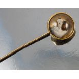 An Essex crystal stick pin, decorated with a terriers head,