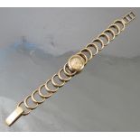 A ladies 9ct gold Jaeger Le Coultre back wind bracelet watch,