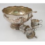 A silver plated punch set, comprising pedestal bowl,