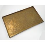 A Keswick School of Industrial Arts brass rectangular tray, highly decorated with scrolls,