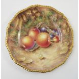 A Royal Worcester cabinet plate, hand painted with fruit to a mossy background by M Johnson,