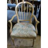 A set of four Continental armchairs, with spindle back supports and hoop arms,