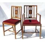 A set of five (4+1) walnut Arts and Crafts Georgian style chairs,