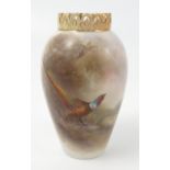 A Royal Worcester vase, decorated with a cock pheasant by James Stinton,