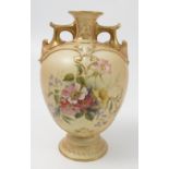A Royal Worcester blush ivory vase, decorated with flowers, having gilt lugg handles,