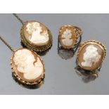 A 9ct gold shell cameo brooch, together with another in base metal,