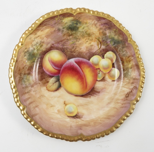 A Royal Worcester side plate, decorated with fruit to a mossy background by C Smith,