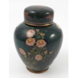 A Chinese cloisonne tea caddy, the dark green ground decorated with flowers and insects,