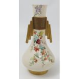 A 19th century Royal Worcester vase, decorated with sprays of  flowers with gilt band and handles,