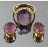 An amethyst single stone dress ring, finger size N,