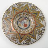 A late 19th century Cantagalli dish, decorated in lustre colours, the border with triangles and