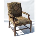 A mahogany Gainsborough style chair, with padded open arms and raised on four moulded legs,