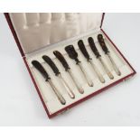 A silver and tortoiseshell cased caviar set, comprising six knives and server,