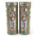 A pair of canton cylindrical vases, decorated with figures, birds and flowers, height 9.