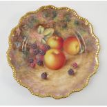 A Royal Worcester cabinet plate, decorated with fruit to a mossy background by H Ayrton,