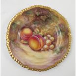 A Royal Worcester side plate, decorated with fruit to a mossy background by C Smith,