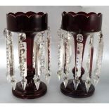 A pair of late 19th century ruby glass lustres, with clear glass droppers,