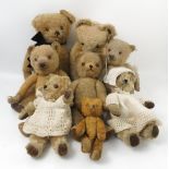 Eight gold plush teddy bears,