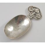 An A E Jones silver caddy spoon,