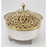 A silver centrepiece, of circular form,