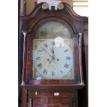 A 19th century oak cross banded long case clock, with arched dial by Edward Matthews of Welshpool,